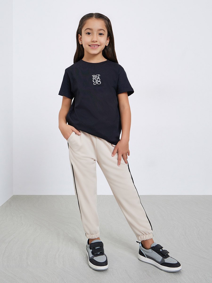 Girls Beige Solid Joggers with Side Binding
