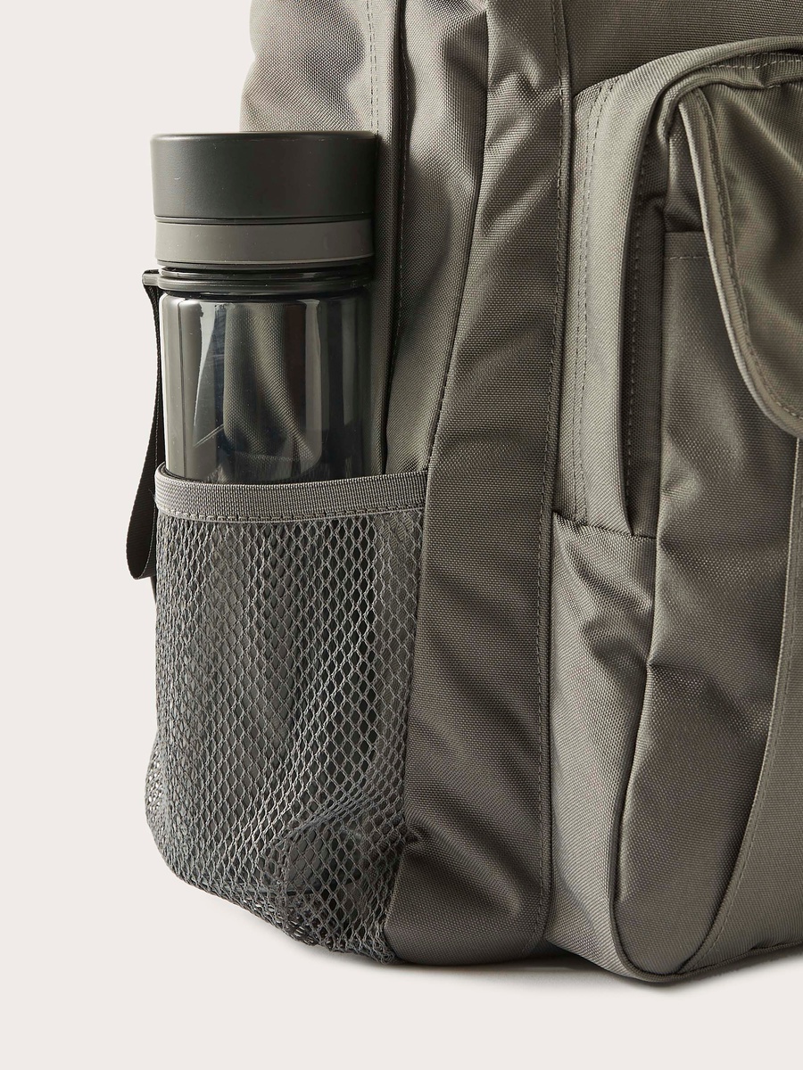 Solid 15-inch Backpack with Adjustable Straps and Zip Closure