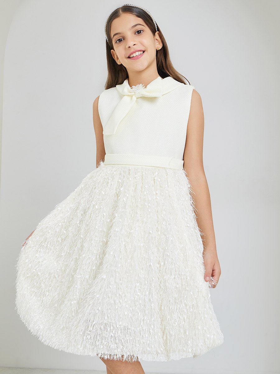 Girls Cream Textured Fringed Detail Dress For Kids at UAE | Styli Girls Cream Textured Fringed Detail Dress For Kids at UAE | Styli