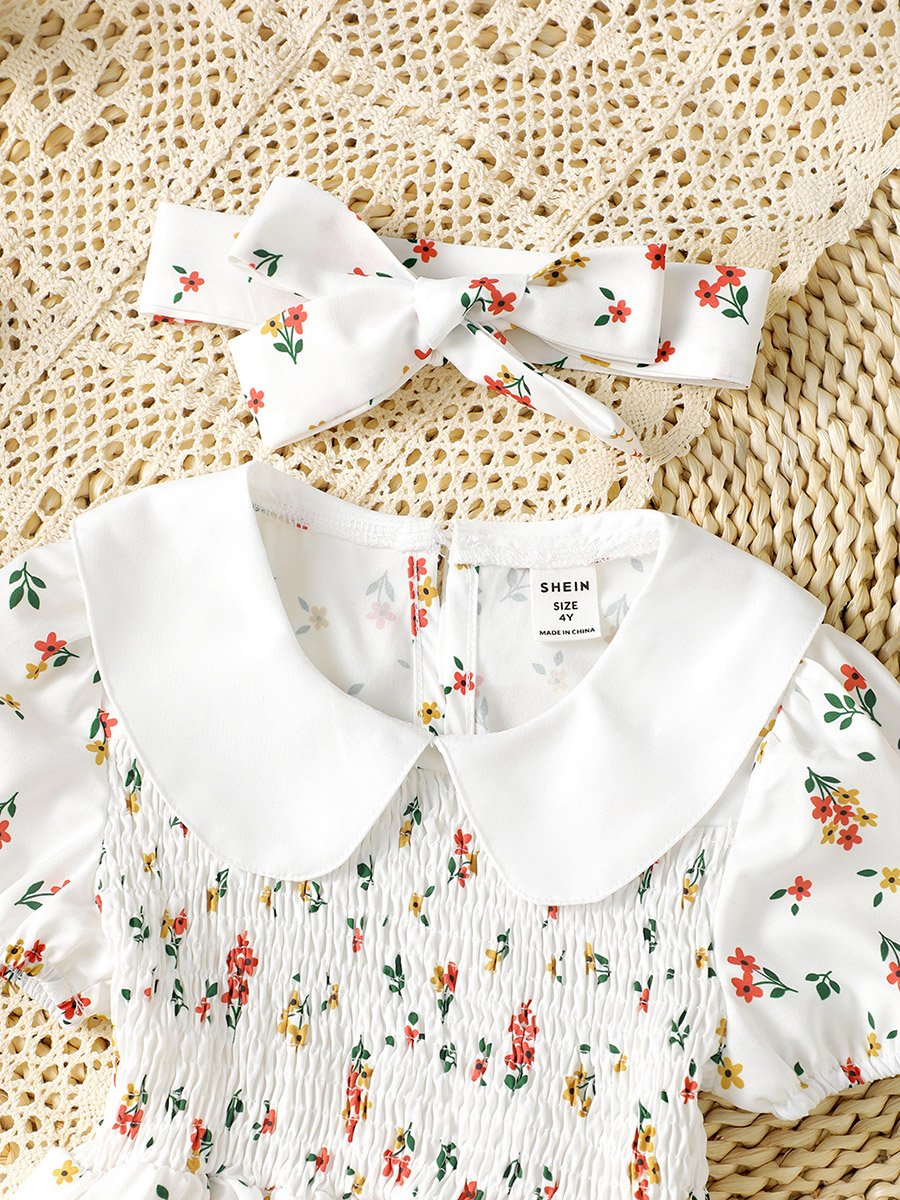 فستان بزم ومداخن وأكمام منفوخة وطبعة أزهار للأطفال