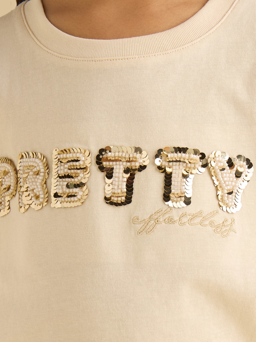 Slogan Embellished Cotton T-Shirt with Frill Hem