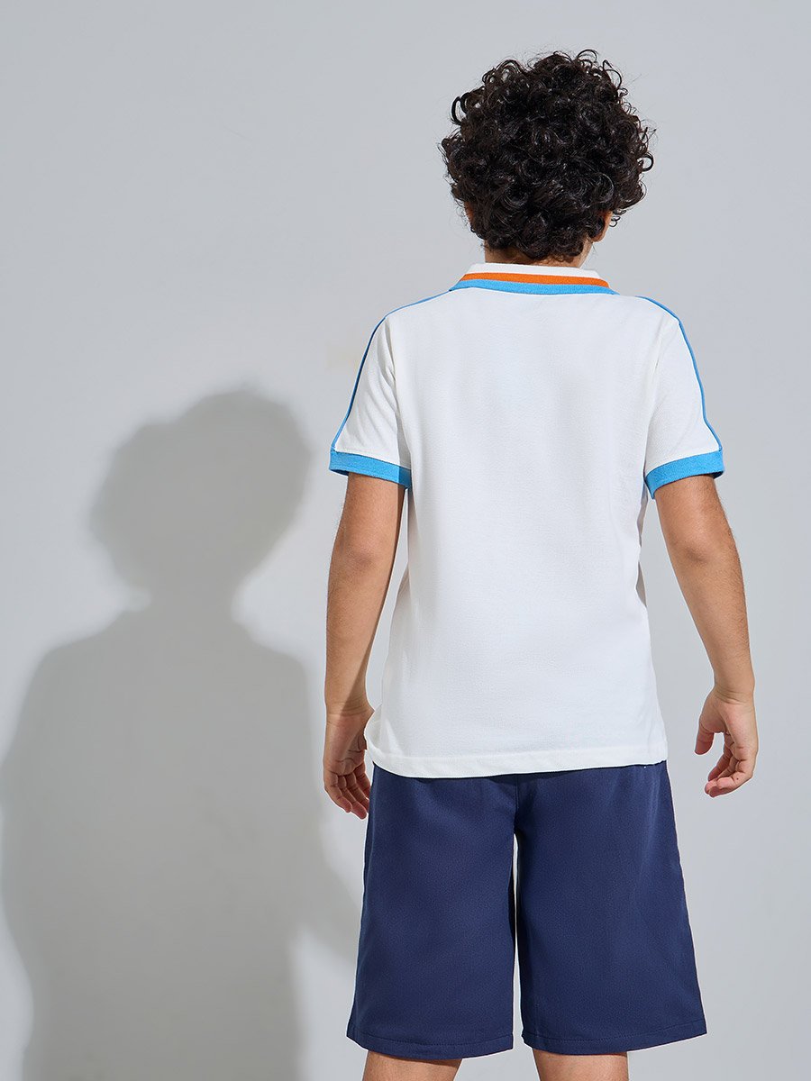 Teen Boys Off White Polo T-Shirt with Baseball Graphic