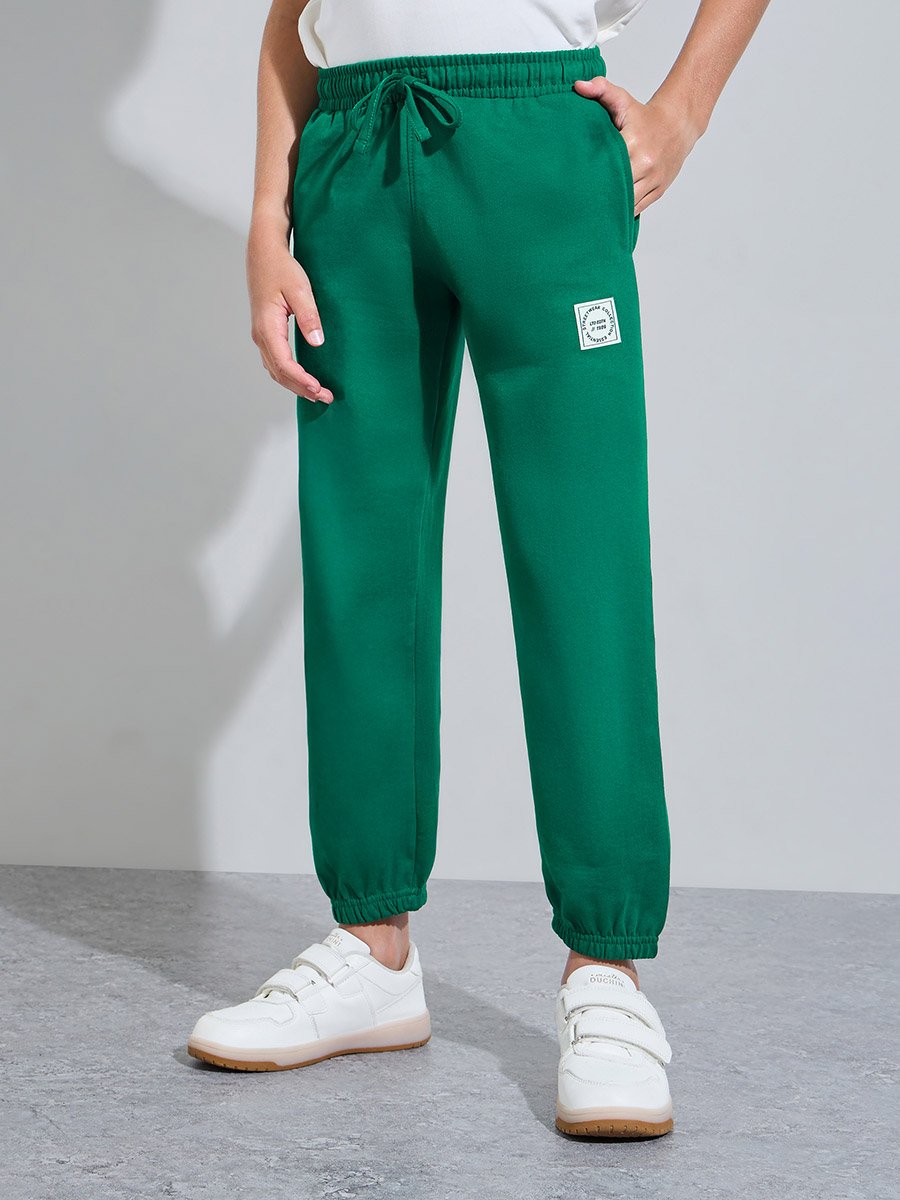 Teen Boys Off White Graphic Print T-Shirt and Green Joggers Set