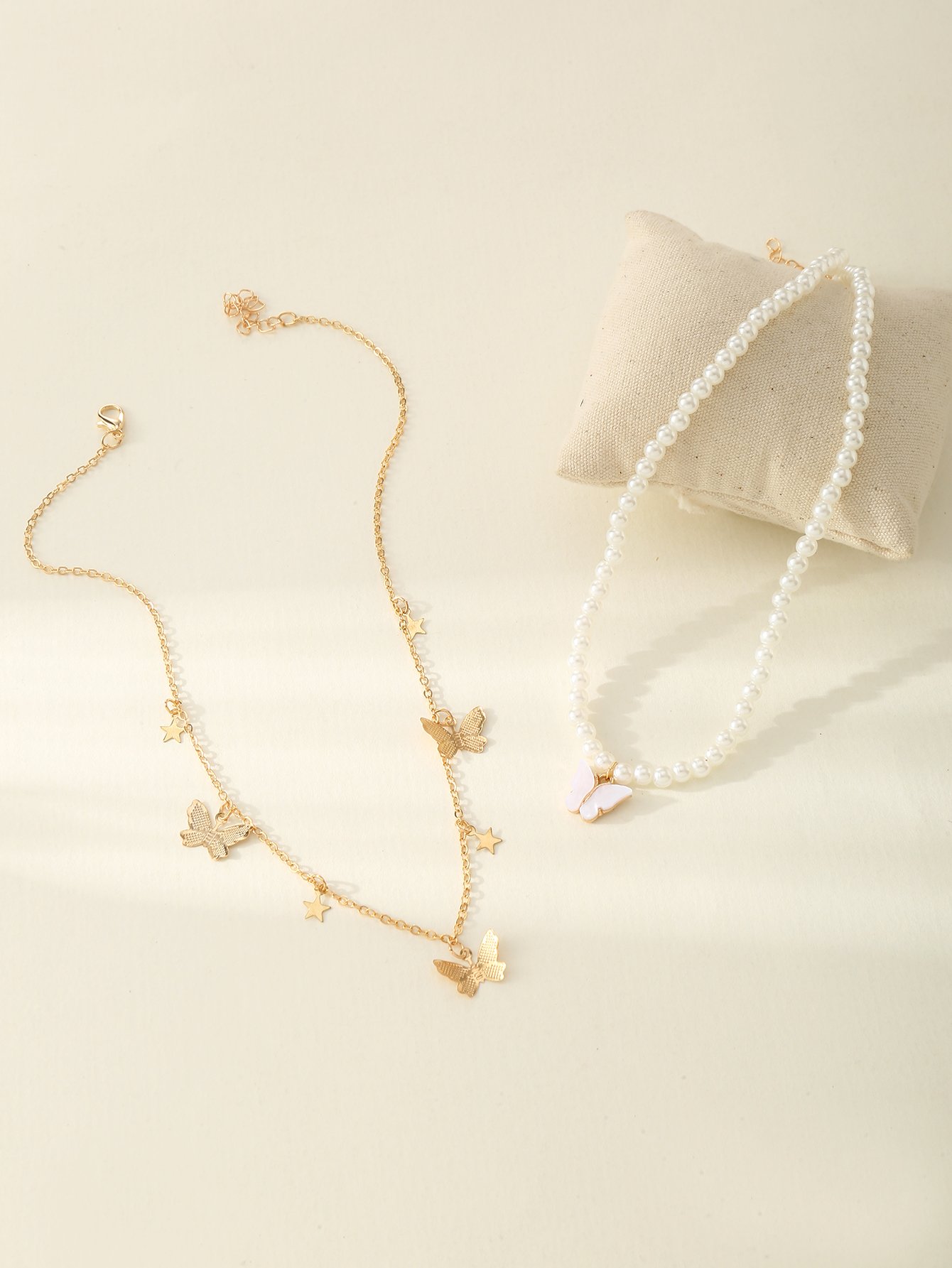 Pack of 2 - Girls Pearl and Butterfly Charm Necklace