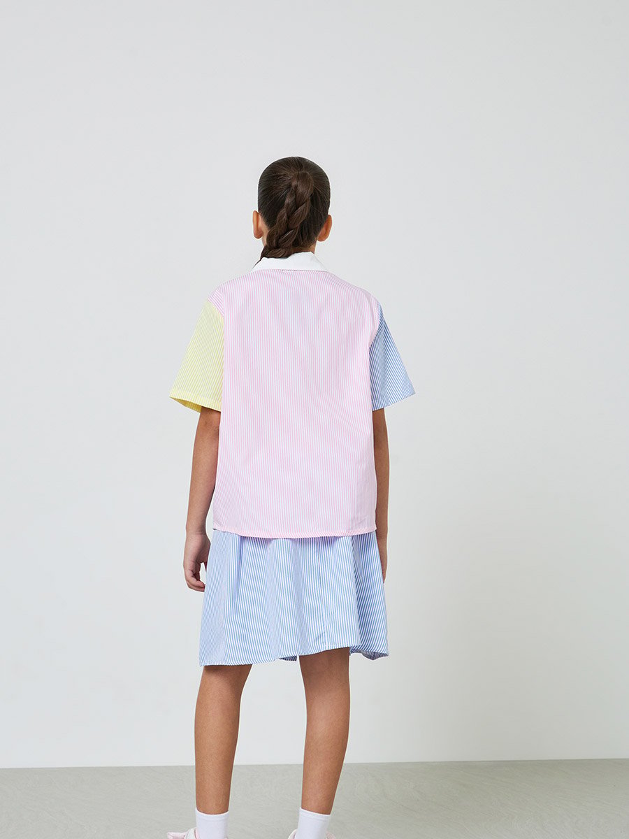 مجموعة من تنورة بكسرات وقميص مريح بنقشة خطوط