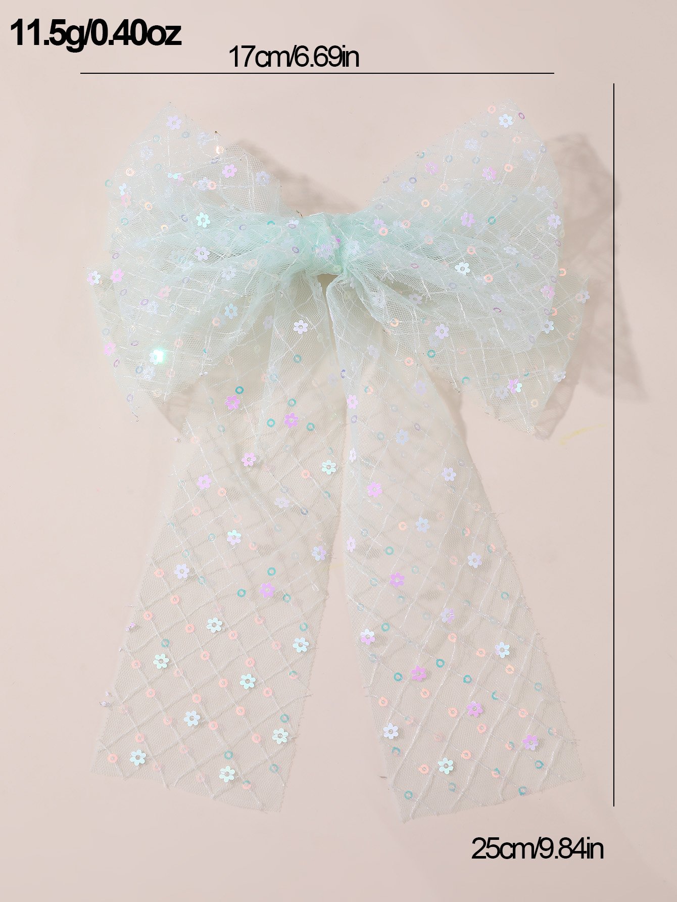 مشبك شعر منمقة بالترتر وفيونكة