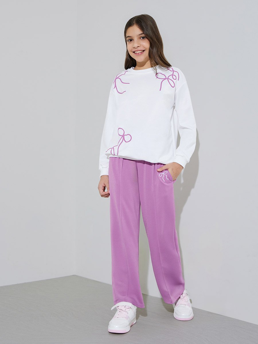 Teen Girls Off White Bow Print Sweatshirt and Purple Pintuck Straight Leg Pants Set