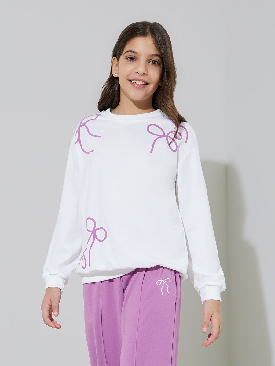 Teen Girls Off White Bow Print Sweatshirt and Purple Pintuck Straight Leg Pants Set