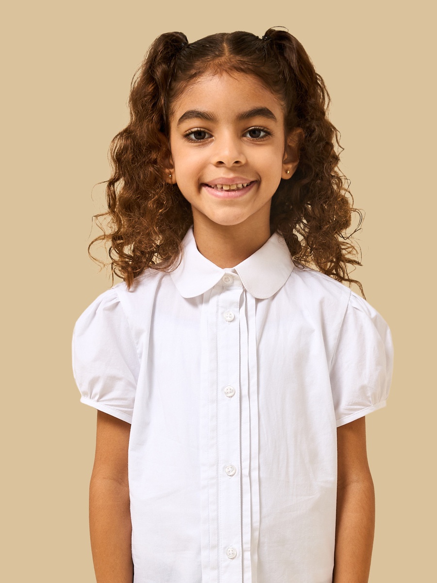 قميص قطن بأكمام منفوخة وثنيات
