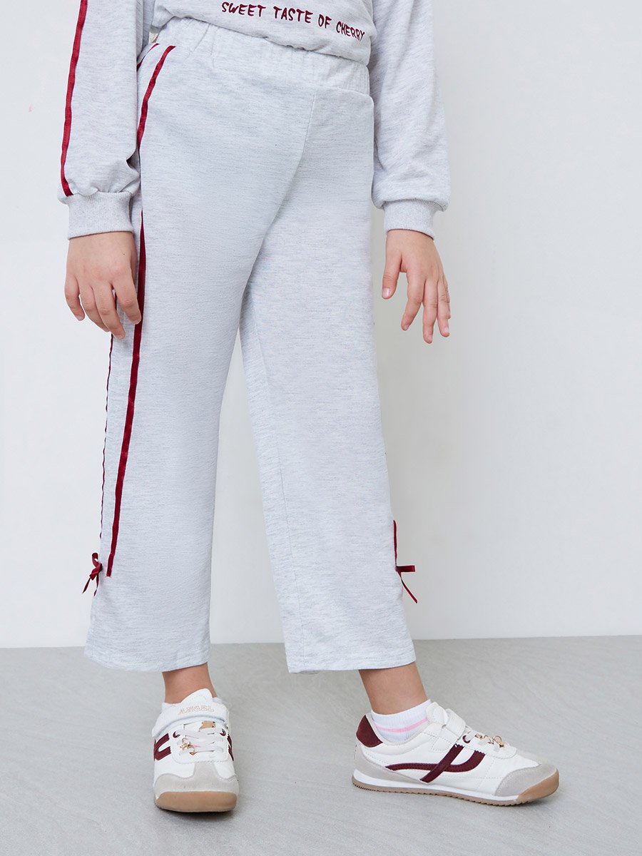 Toddler girl set with full sleeve graphic tee and wide leg jogger with side stripe and bow details