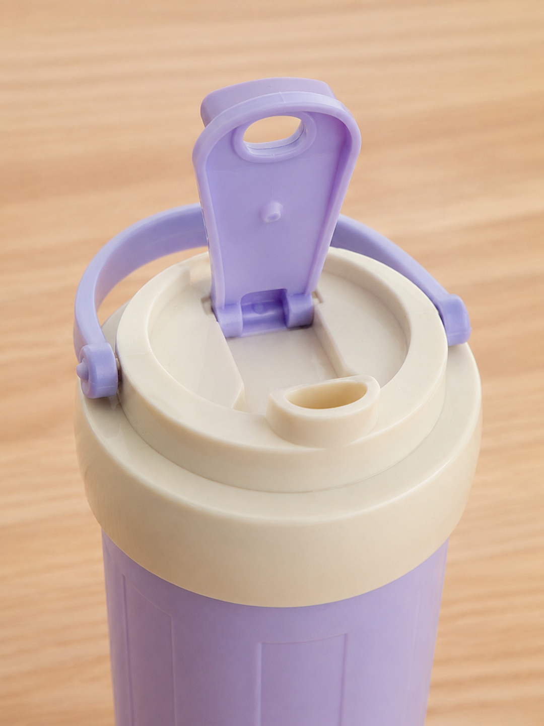 Purple Plastic Water Bottle with Carry Handle and Flip-Top Lid
