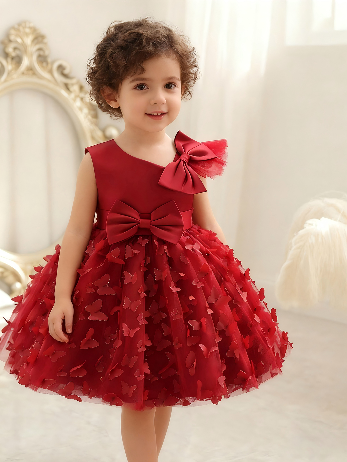 فستان بطبعة فراشة باللون العنابي