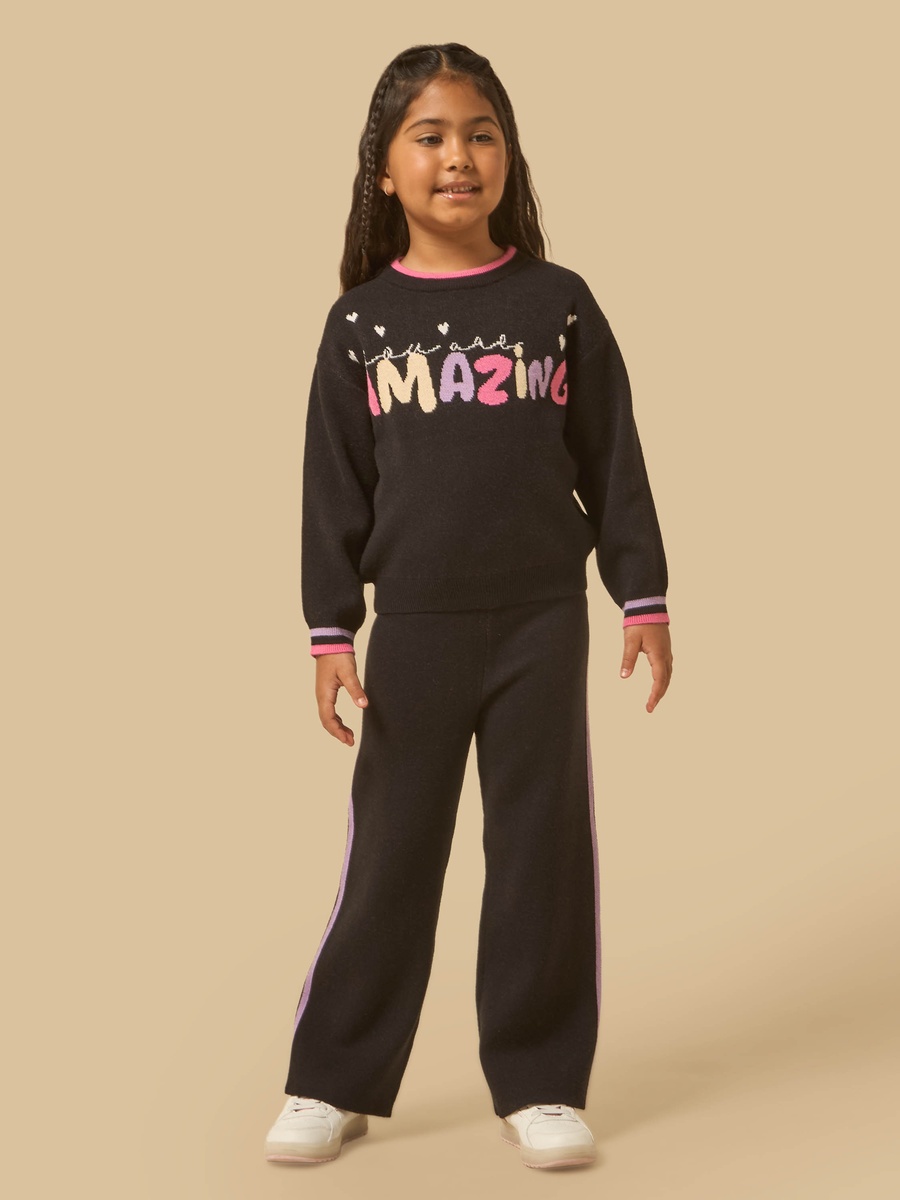 طقم كنزة بارزة الملمس وبنطلون واسع الساقين