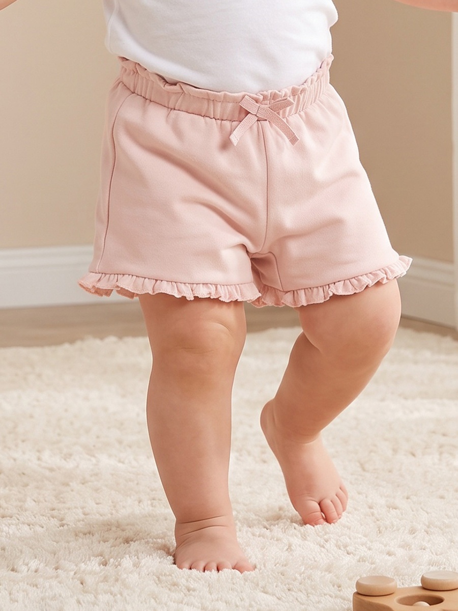 Above Knee Elasticated Waist Shorts with Ruffle Detail