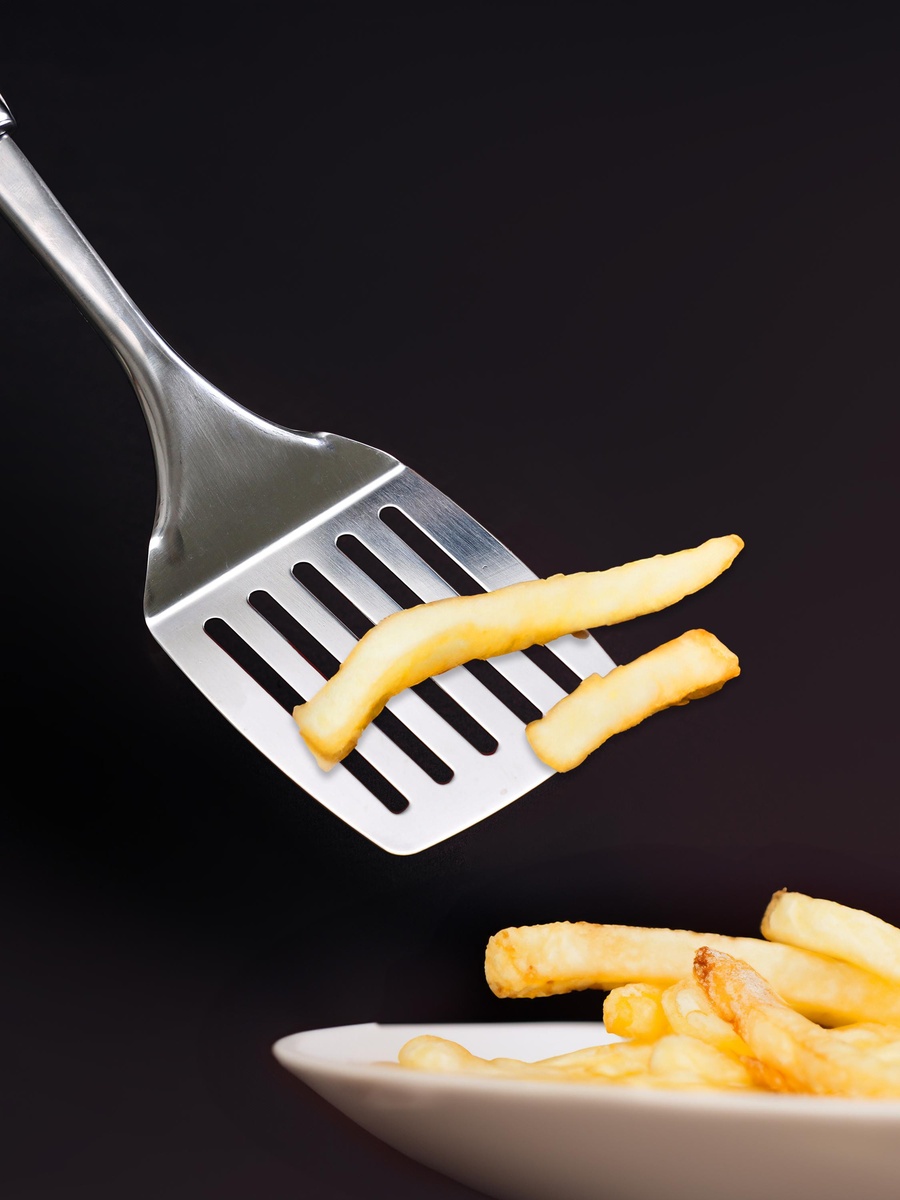 أداة تقليب مثقوبة ستانلس ستيل بمقبض أسطواني
