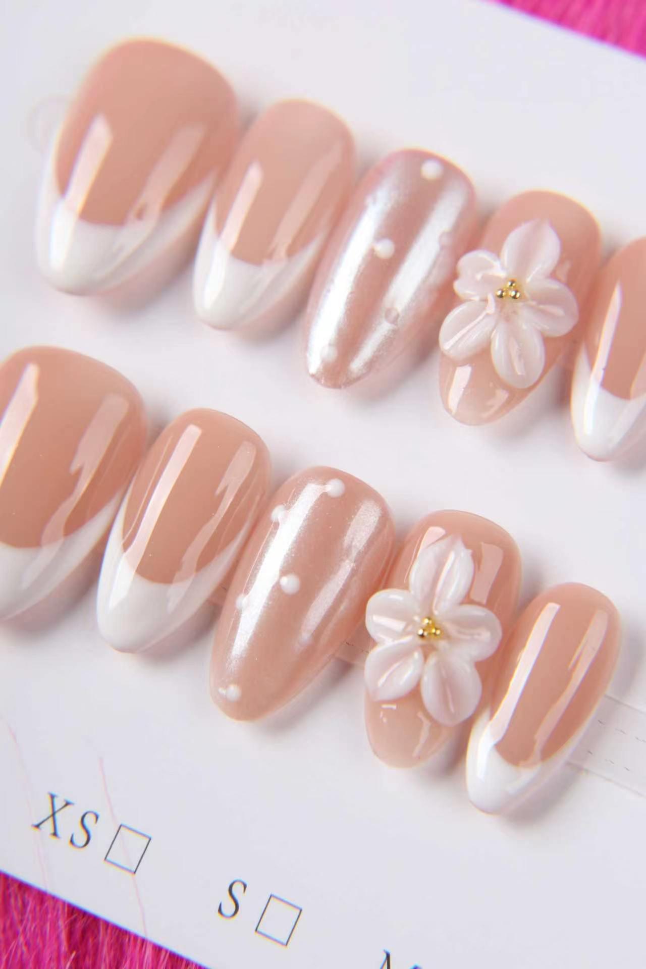 Almond French Tip Nails with 3D Floral and Pearl Accents
