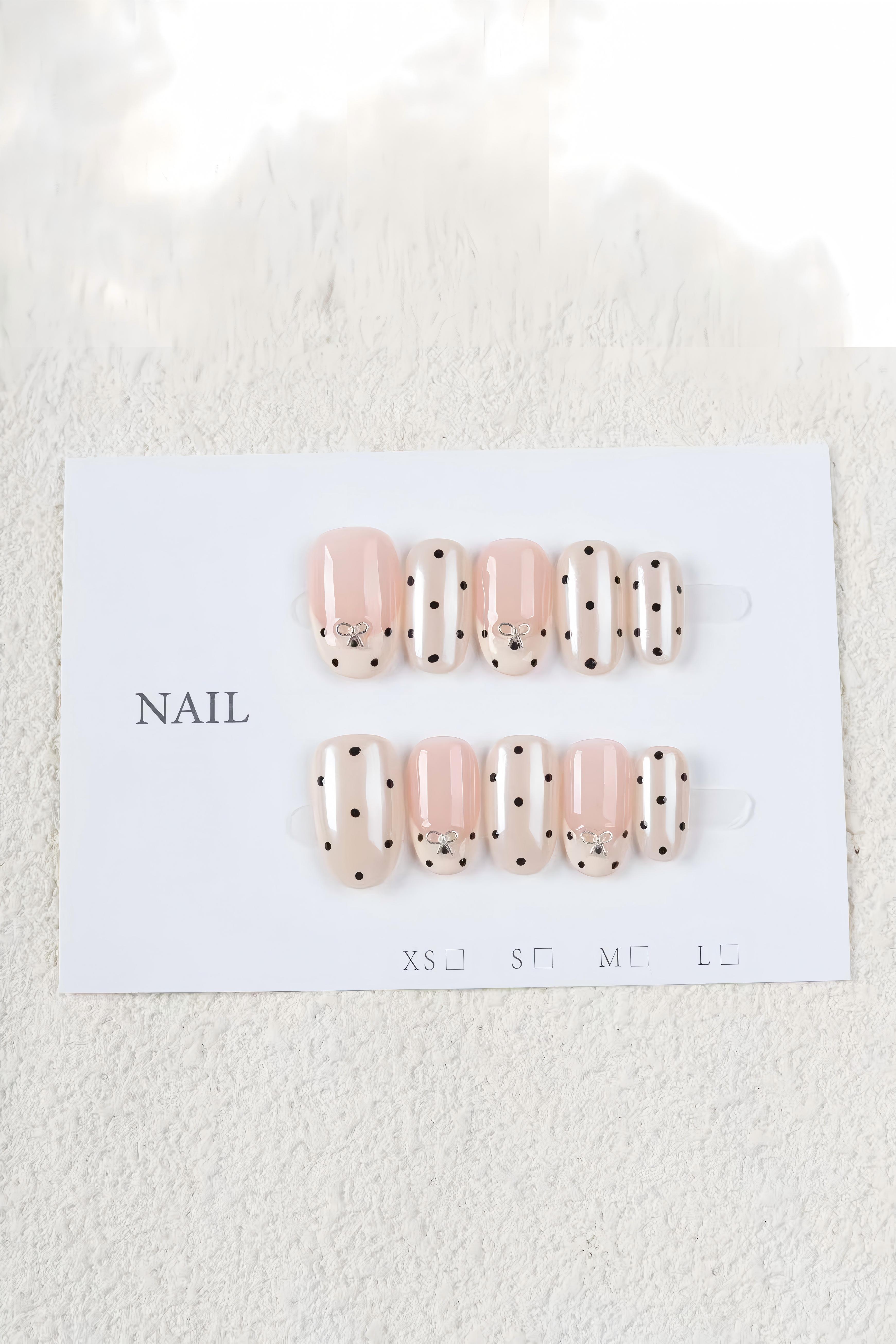 Long-Lasting Cream Polka Dot Artificial Nails with Bow Accent
