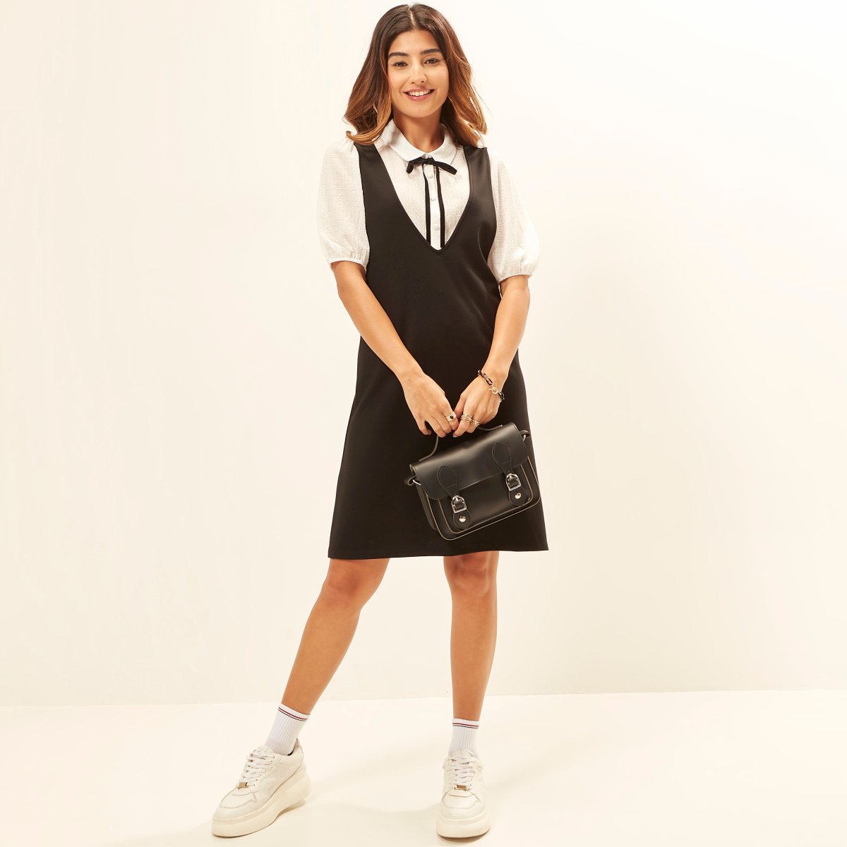 Solid Sleeveless Pinafore Knee Length Dress with V Neck For Women at Bahrain | Styli Solid Sleeveless Pinafore Knee Length Dress with V Neck For Women at Bahrain | Styli
