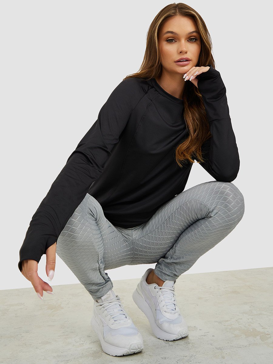 Thumbhole and Tonal Piping Detail Long Sleeve Top