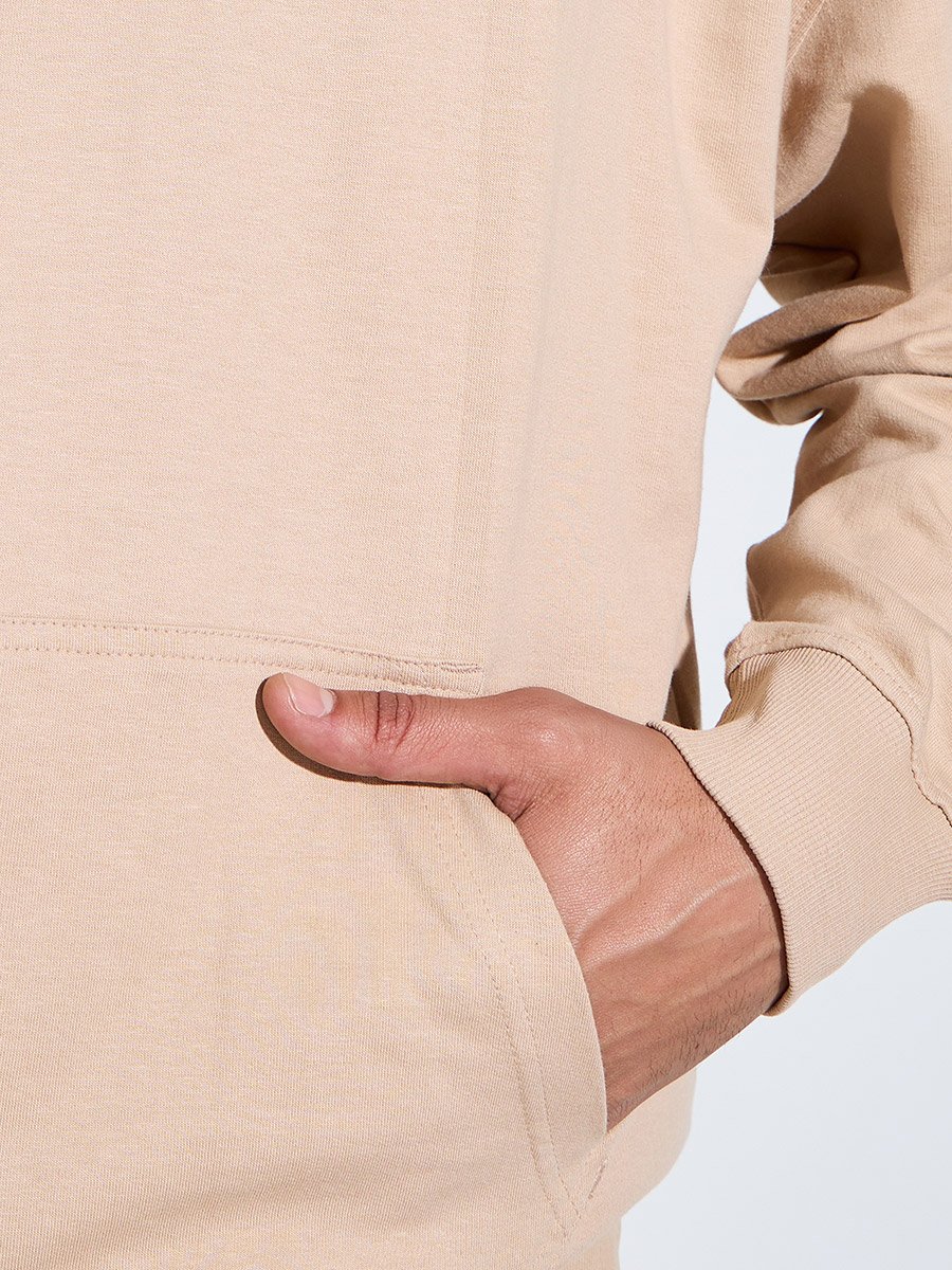 هودي واسع بجيب كانغرو سادة باللون البيج