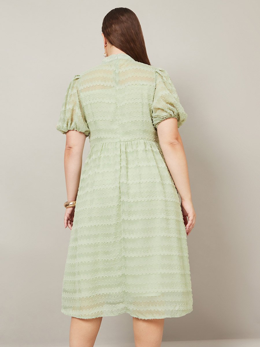 Plus High Neck Textured Dobby A-Line Midi Dress For Women at Saudi | Styli