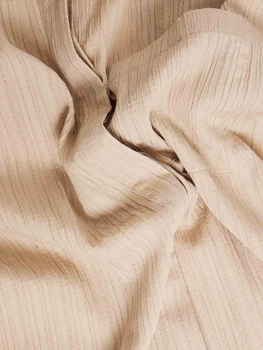بلوزة طويلة واسعة بكتف منخفض