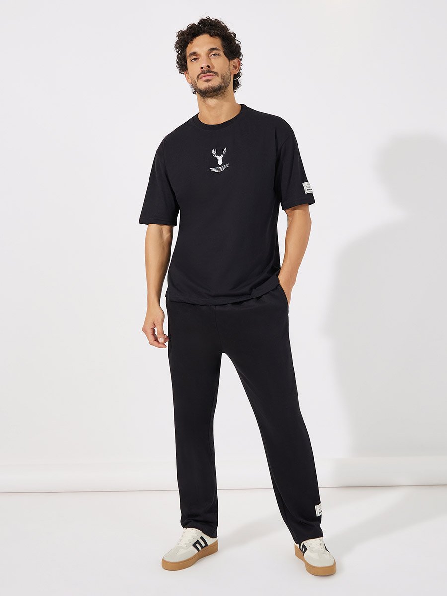Reindeer Graphic Oversized T-Shirt with Sleeve Badge