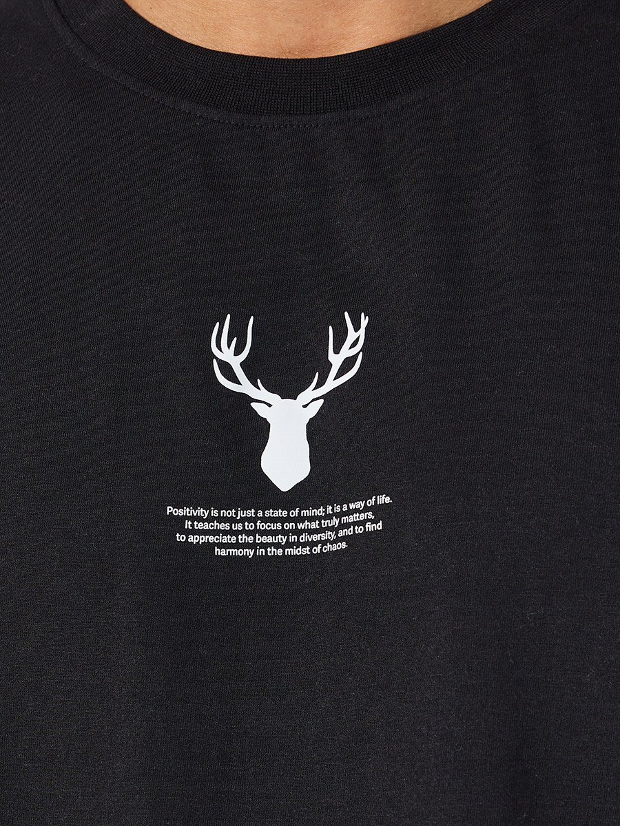 Reindeer Graphic Oversized T-Shirt with Sleeve Badge