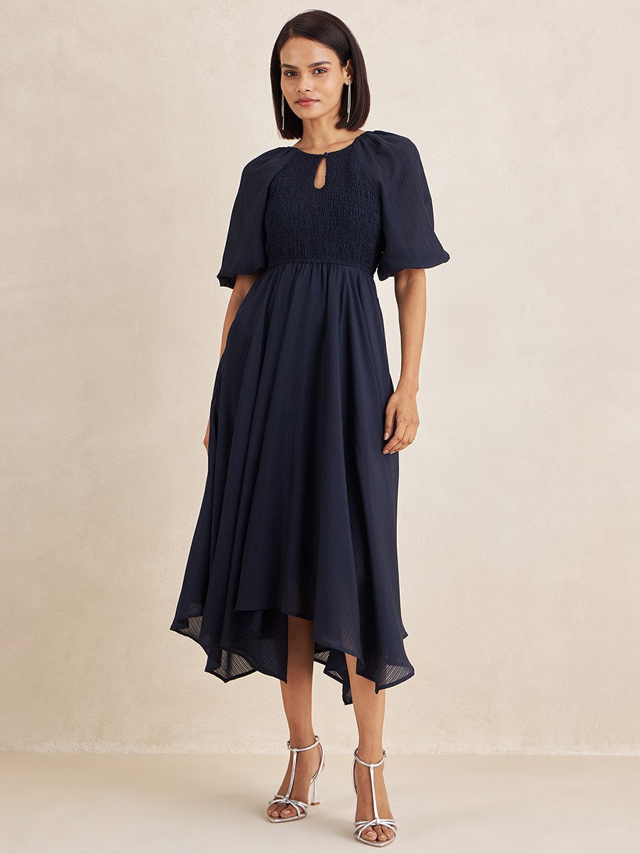 smocked asymmetric midi dress Fuchsia Smocked Ruffle Long Sleeve Midi Dress – PinkBlush