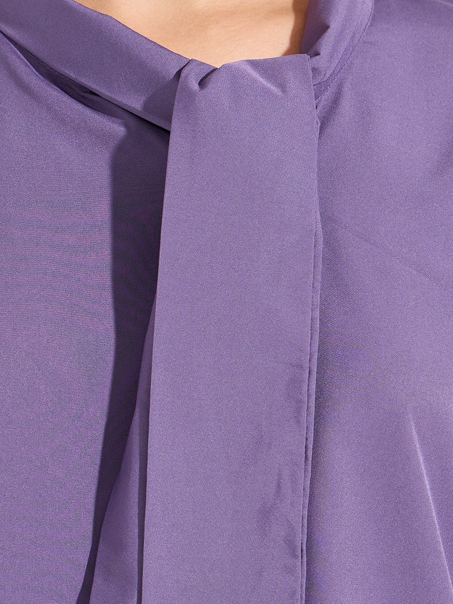 بلوزة باكمام طويلة مكبلة مع ياقة باربطة