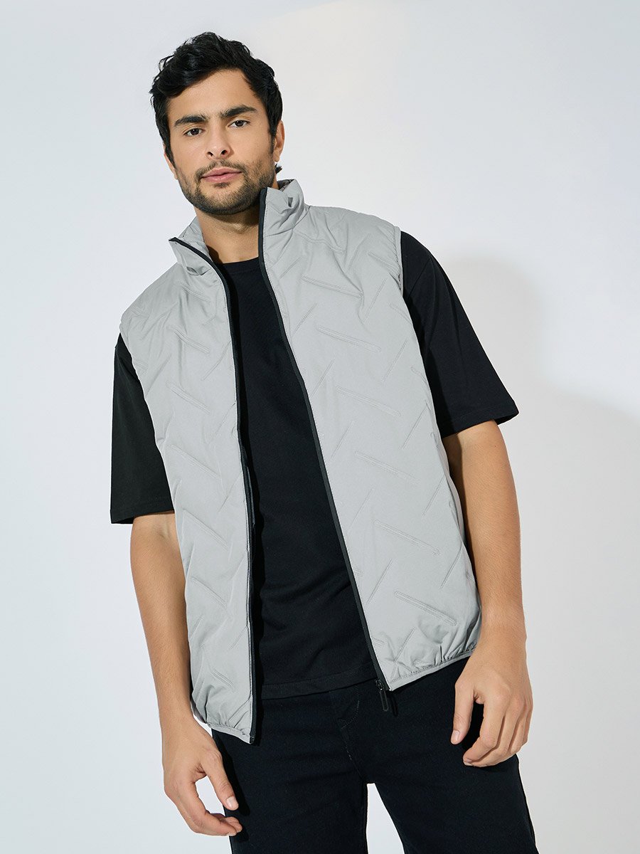 Diagonal Quilted Sleeveless Puffer Jacket with Welt Pockets