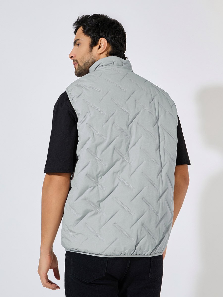 Diagonal Quilted Sleeveless Puffer Jacket with Welt Pockets