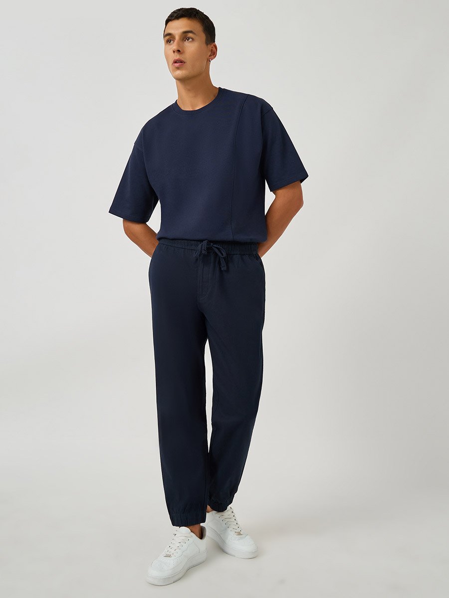Solid Relaxed Fit Elasticated Cuffed Joggers with Drawstring