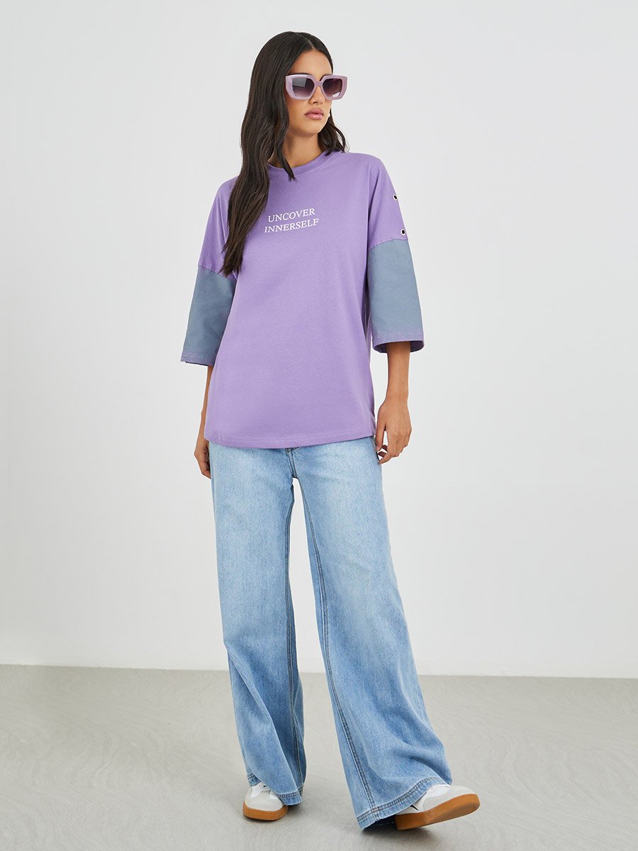 Spray Painted Exaggerated Shoulder Oversized T-Shirt with Eyelet Detail