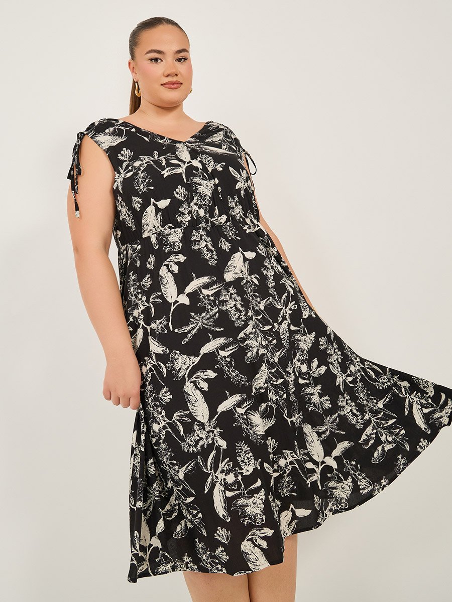 Plus Size All-Over Floral Print Sleeveless Knee Length Dress For Women at  Kuwait | Styli