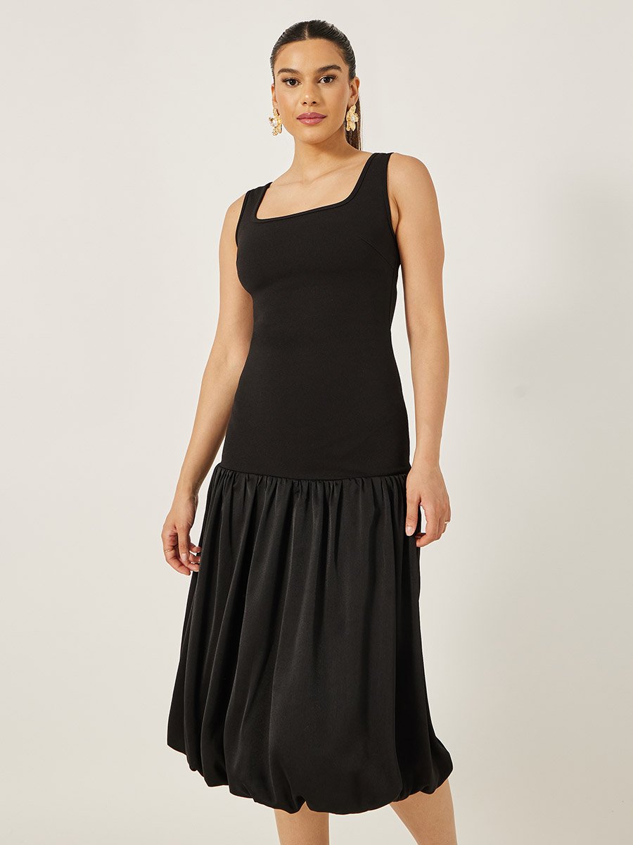 Solid Sleeveless Drop Waist A-Line Midi Dress For Women at Bahrain | Styli