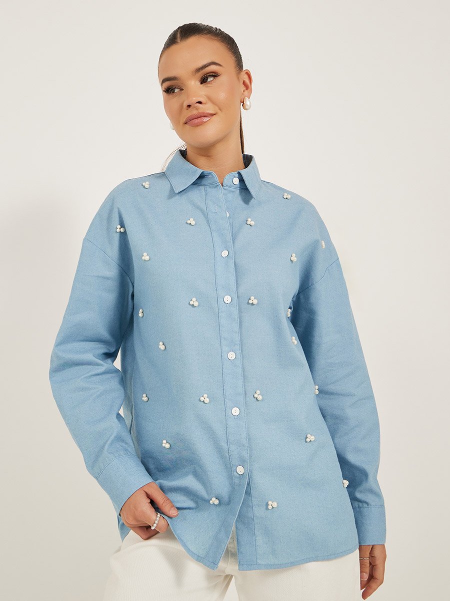 بلوزة منمقة بلؤلؤ صناعي وأكمام طويلة