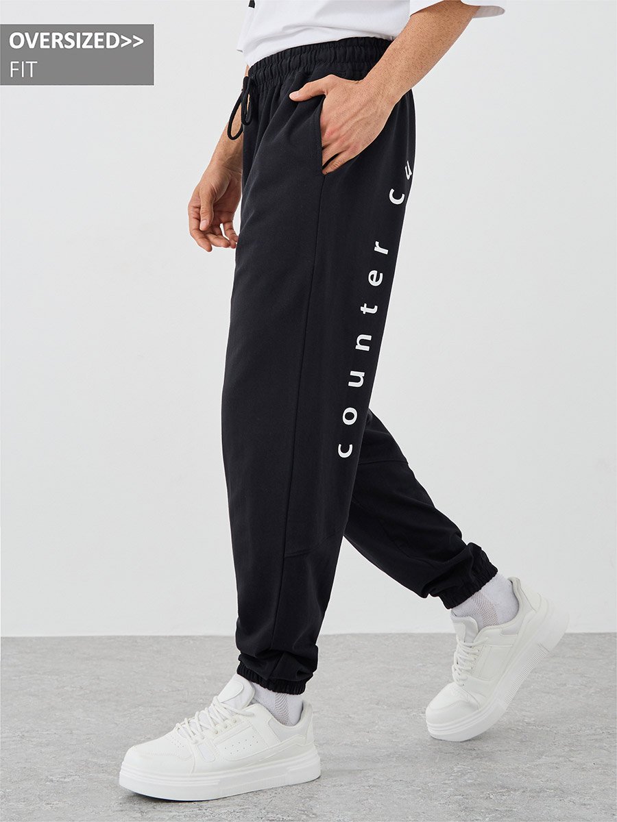 Back Slogan Print Cut and Sew Oversized Joggers with Drawstring