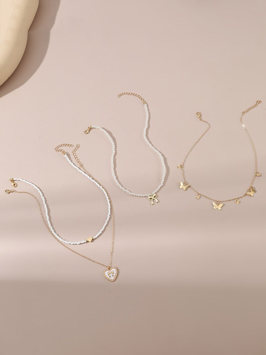 Set of 4 - Bow Pendant Faux Pearl Necklace
