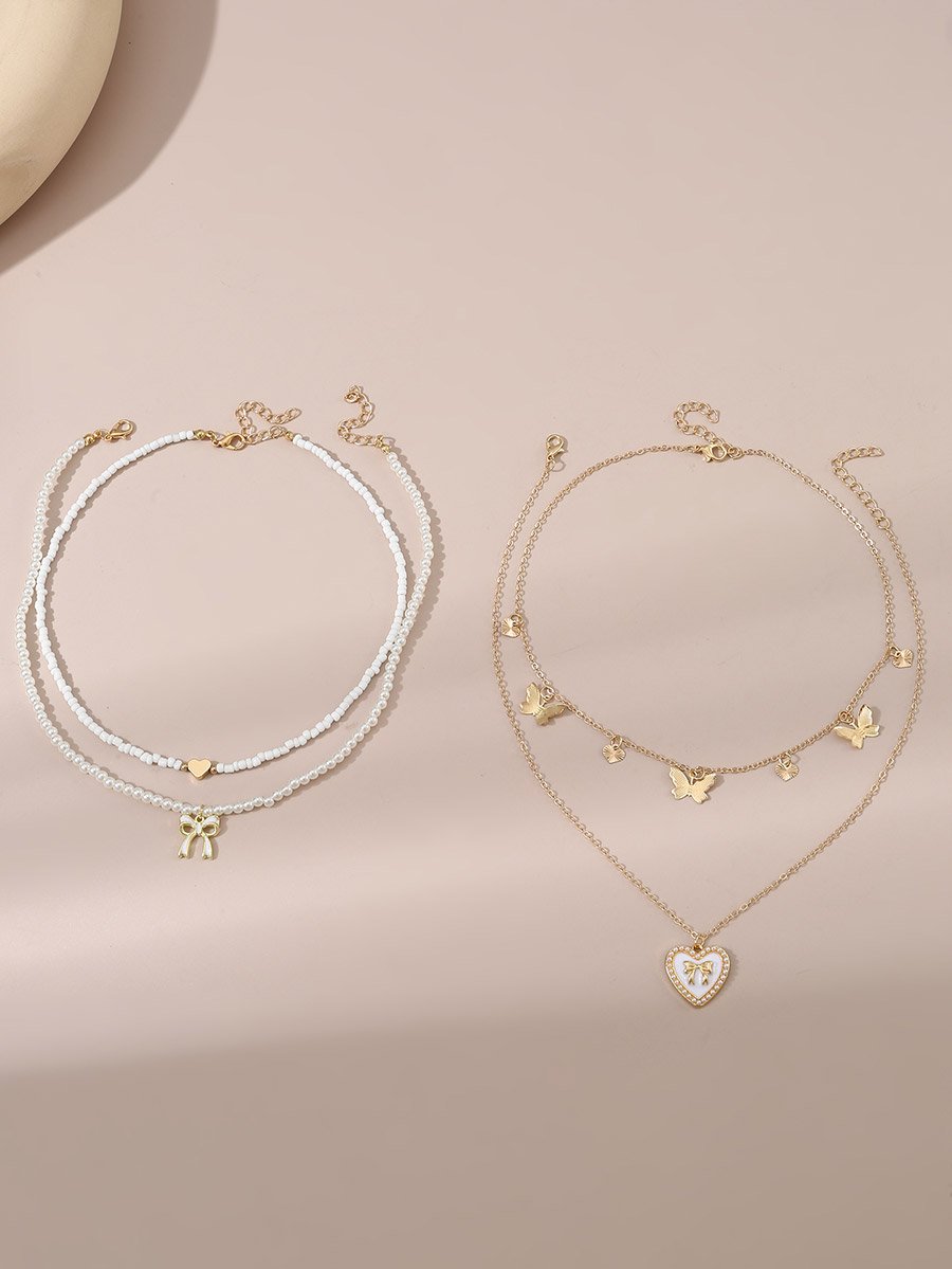 Set of 4 - Bow Pendant Faux Pearl Necklace