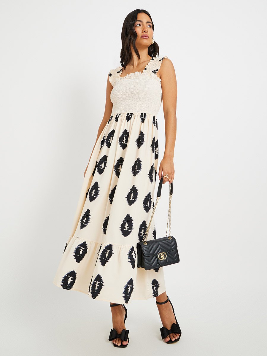 Printed Sleeveless A-Line Maxi Dress with Smocked Detail For Women at Kuwait | Styli Printed Sleeveless A-Line Maxi Dress with Smocked Detail For Women at Kuwait | Styli