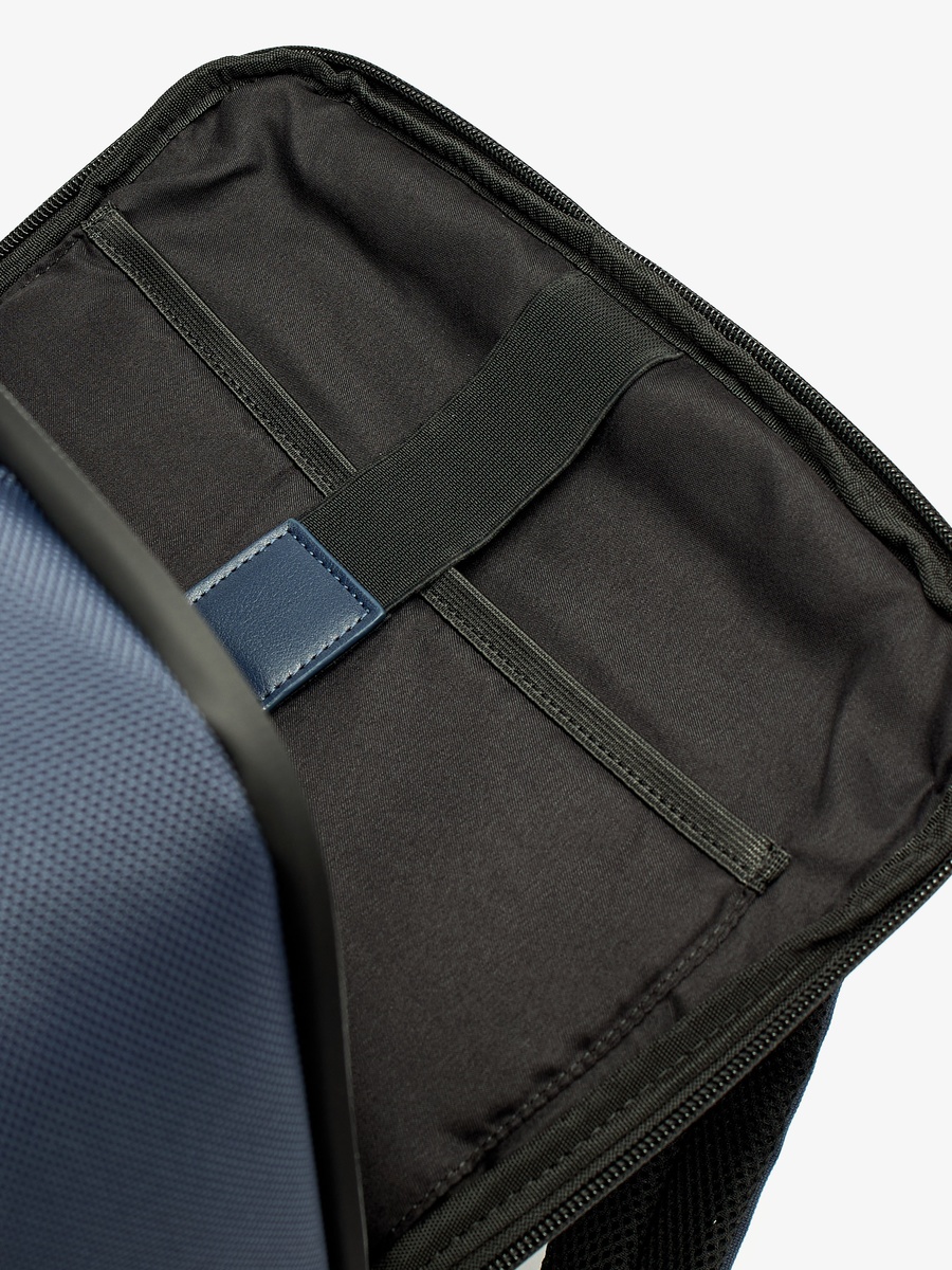 Solid Backpack with Adjustable Straps and Zip Closure
