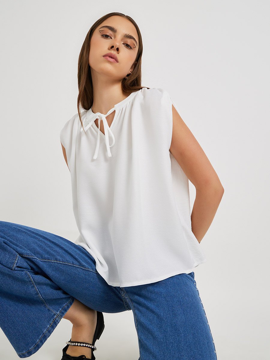 Solid Sleeveless Tie-Up Neck Blouse