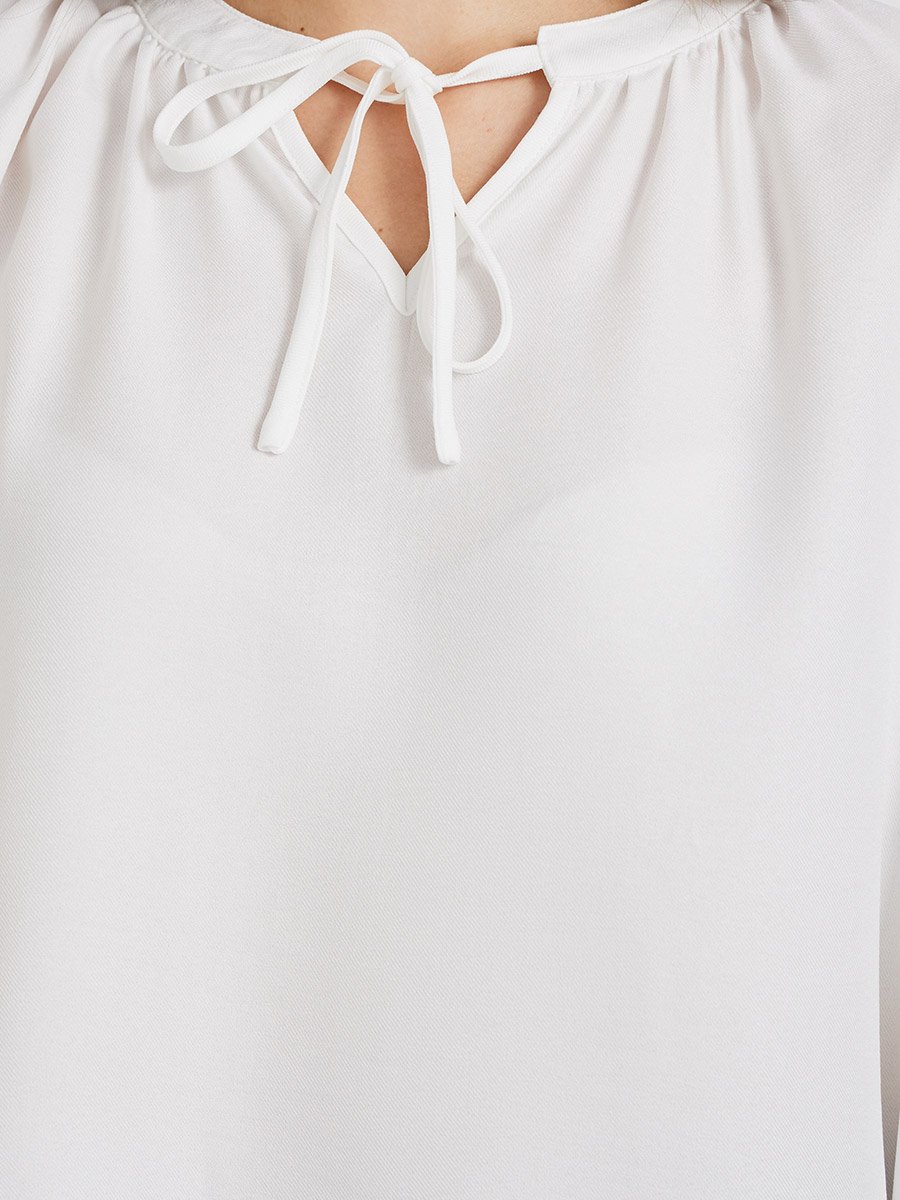 Solid Sleeveless Tie-Up Neck Blouse
