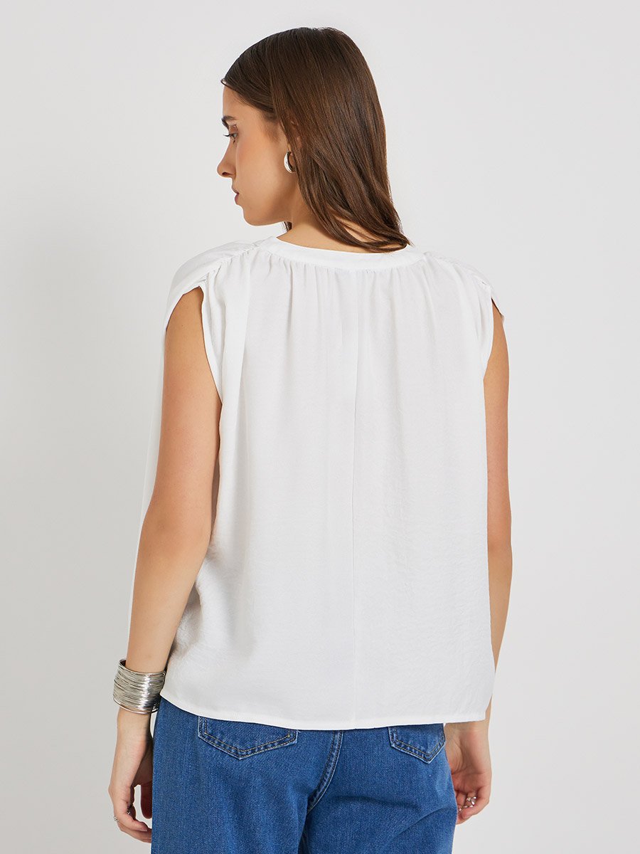 Solid Sleeveless Tie-Up Neck Blouse
