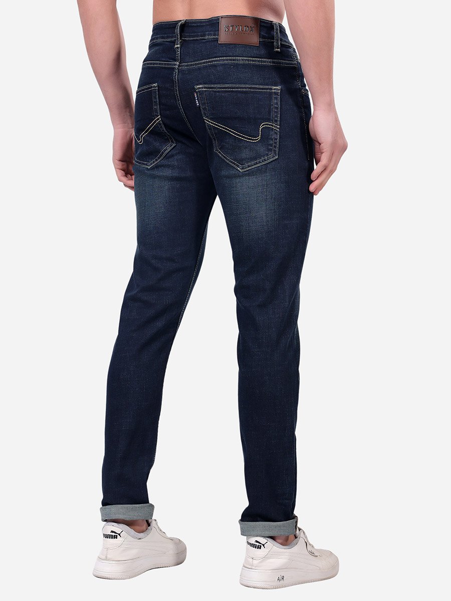 Mid Rise Whiskered Faded Slim Fit Jeans
