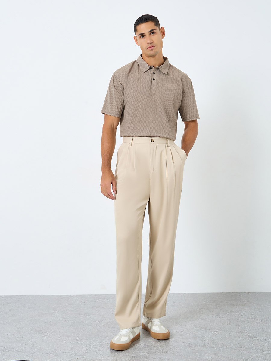 Men Cream Relaxed Fit Pleated Trousers For Men at UAE | Styli