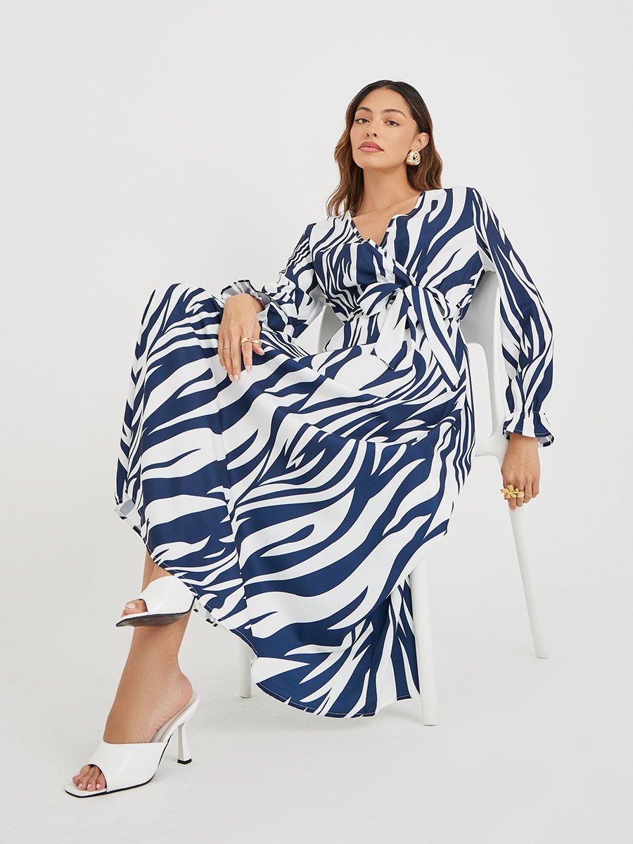Women Abstract Printed V Neck Belted A-Line Maxi Dress