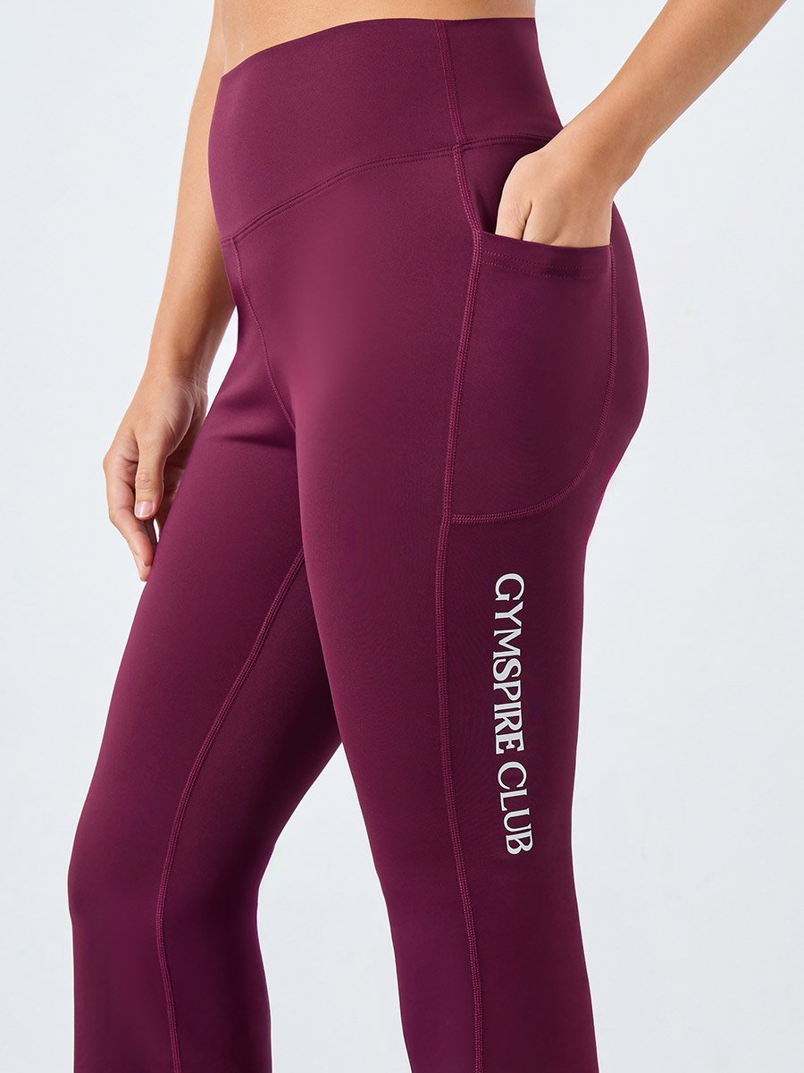 Gymspire Edition - Label Broad Waist Side Pocket Flared Leggings with Text Detail