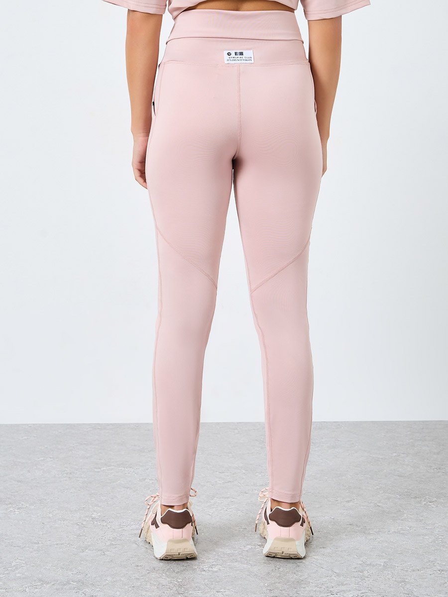 Gymspire Edition - Label and Tab Back Waist Pocket Leggings